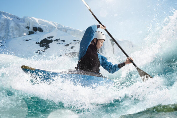 woman-kayak-sails-mountain-river-whitewater-kayaking-extreme-kayaking